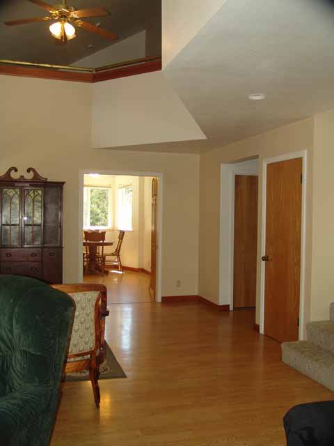 country kitchen with greenhouse window, propane range, refrigerator and dishwasher included.